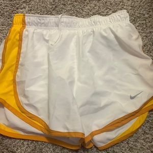 white and orange nike short